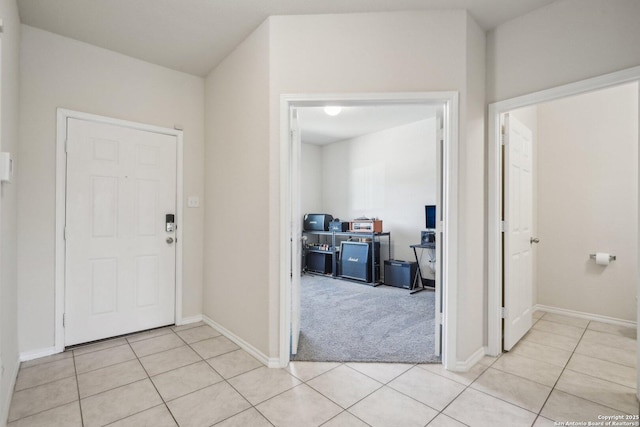 entrance foyer with light tile patterned flooring