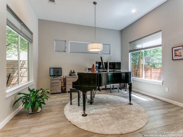 misc room with light hardwood / wood-style flooring