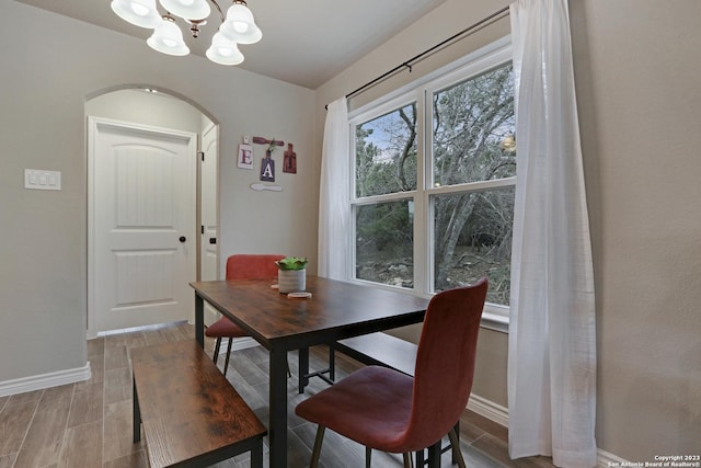652 Canyon Bnd, Canyon Lake, TX 78133 - dining room featuring a chandelier