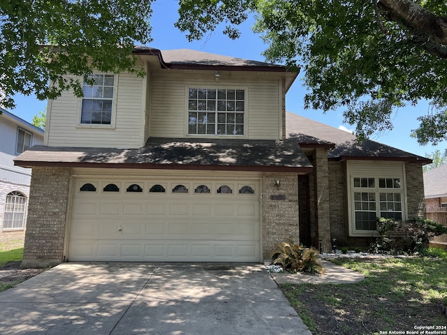 view of front of home with a garage