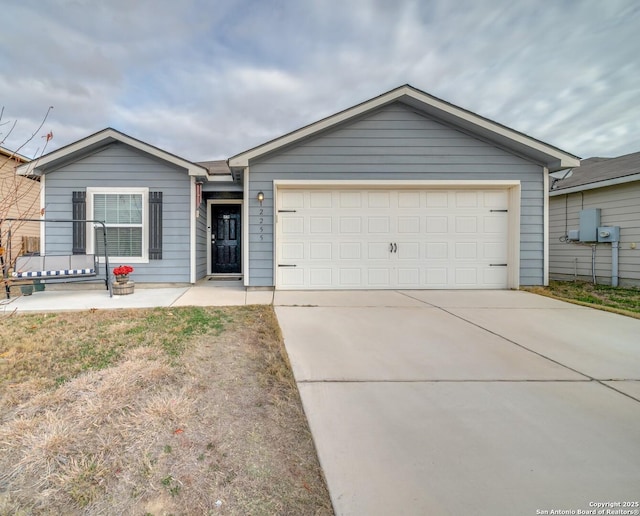 ranch-style house featuring a garage