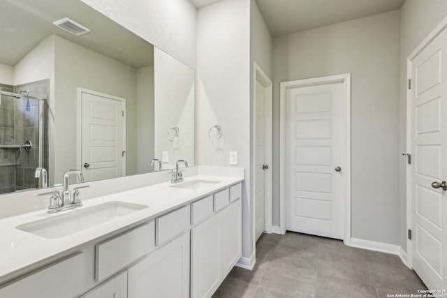 bathroom with vanity and walk in shower