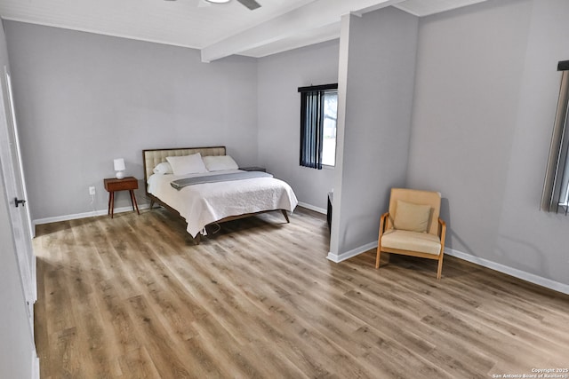 bedroom with light wood-type flooring and ceiling fan