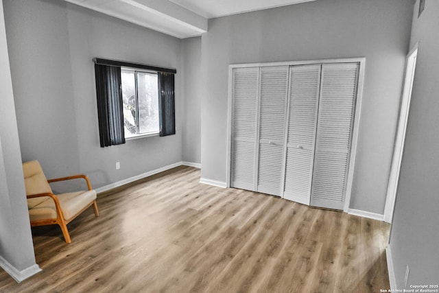 unfurnished room with light hardwood / wood-style flooring