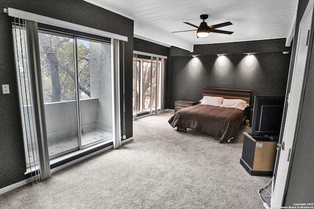 carpeted bedroom with ceiling fan and access to outside