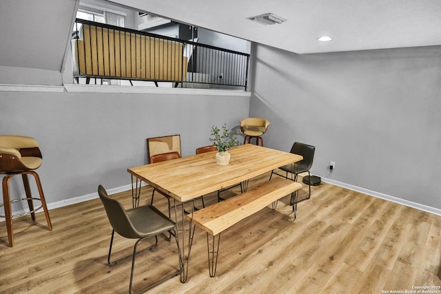 dining room featuring hardwood / wood-style flooring