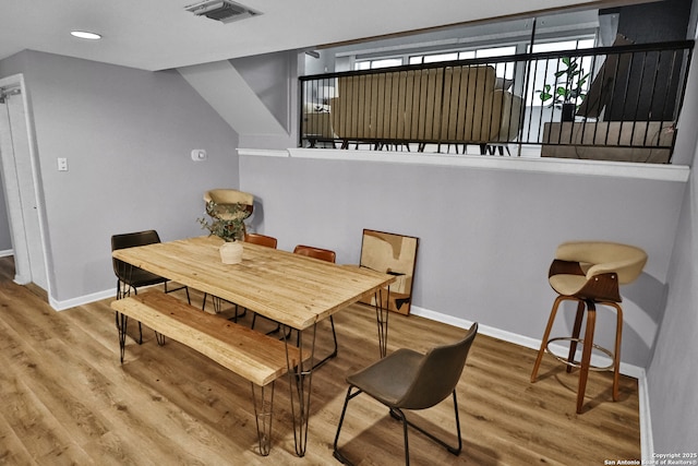 dining room featuring hardwood / wood-style flooring