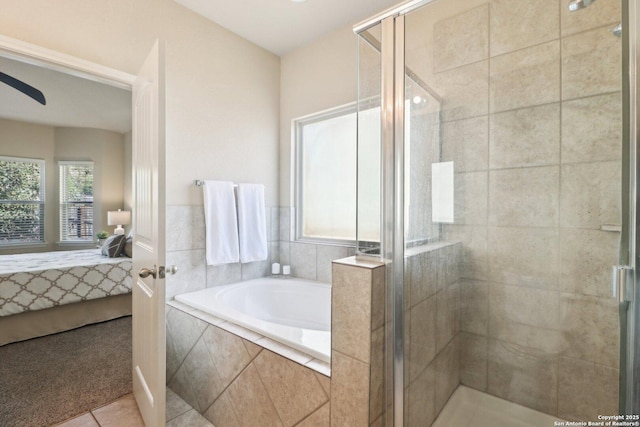 bathroom featuring ceiling fan, separate shower and tub, and tile patterned flooring