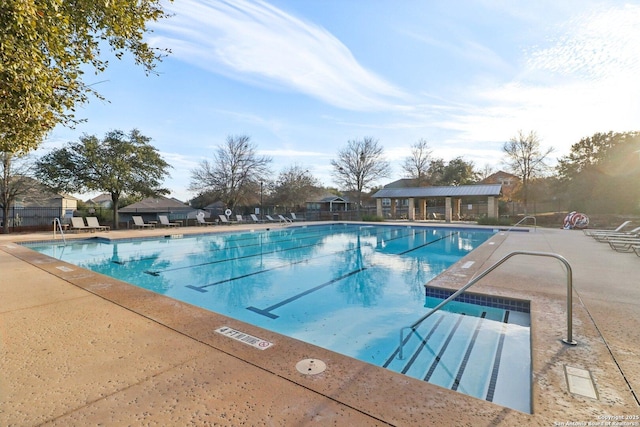 view of pool featuring a patio