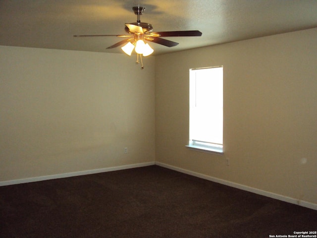 spare room featuring ceiling fan