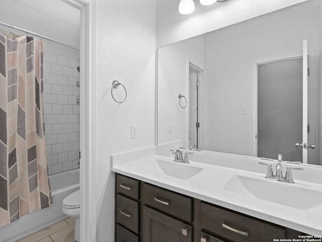 full bathroom with toilet, vanity, and shower / tub combo with curtain