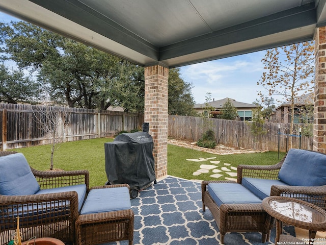 view of patio / terrace with an outdoor living space and area for grilling