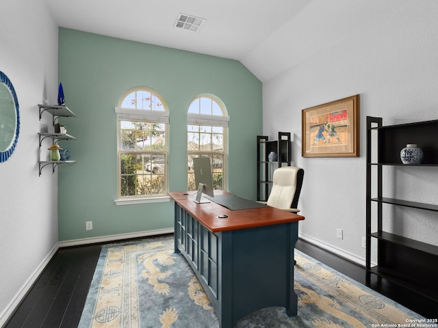 office featuring vaulted ceiling and dark hardwood / wood-style floors