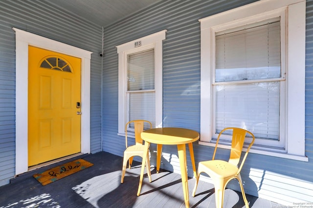 property entrance with covered porch