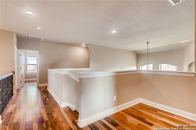 hall featuring hardwood / wood-style floors