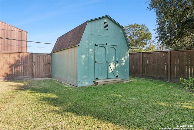 view of outdoor structure with a yard