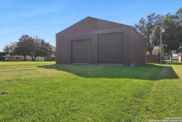 garage with a yard