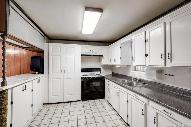 kitchen with white cabinetry and range with gas stovetop