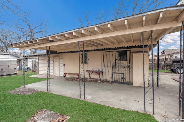 view of patio / terrace featuring a carport