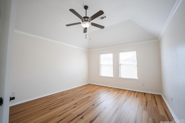 unfurnished room with vaulted ceiling, ceiling fan, crown molding, and wood-type flooring