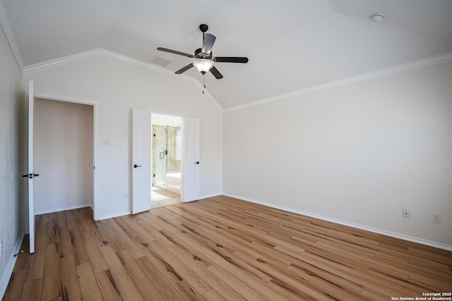 interior space featuring light wood-type flooring, ceiling fan, ornamental molding, and lofted ceiling