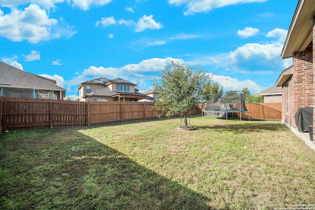 view of yard featuring a trampoline