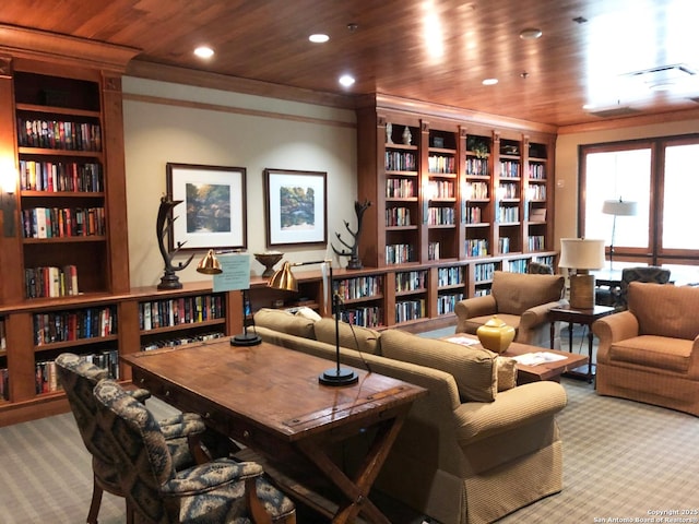 sitting room with light carpet, wood ceiling, and crown molding