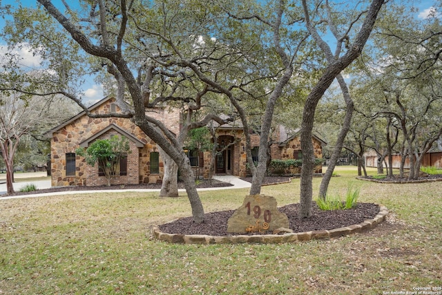 exterior space featuring a front yard