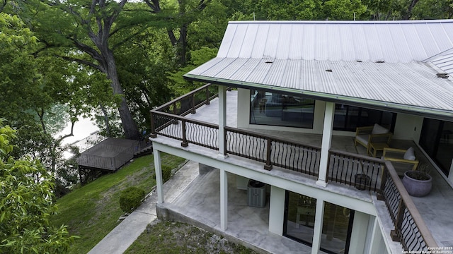 deck with a patio and central air condition unit