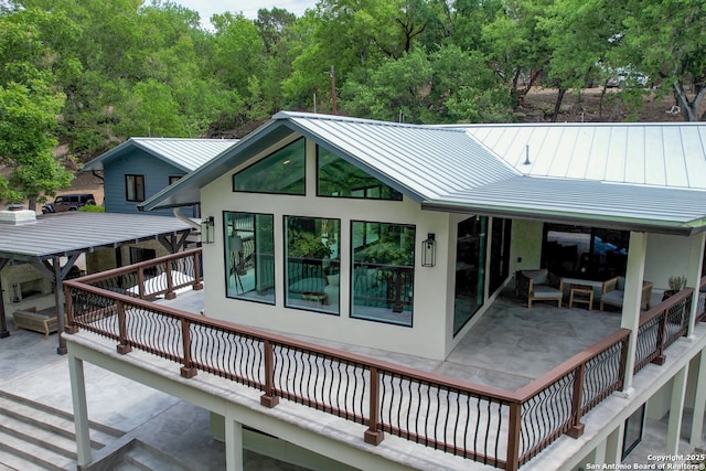 rear view of property with a patio area