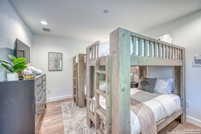 bedroom featuring light wood-type flooring