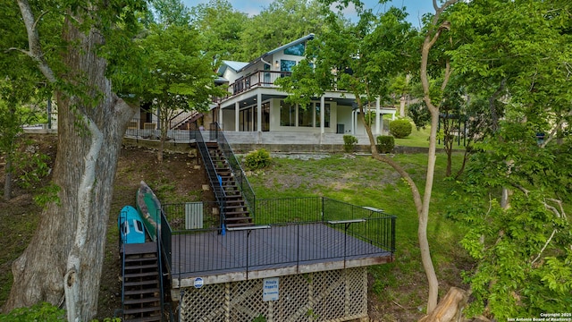 exterior space featuring a wooden deck