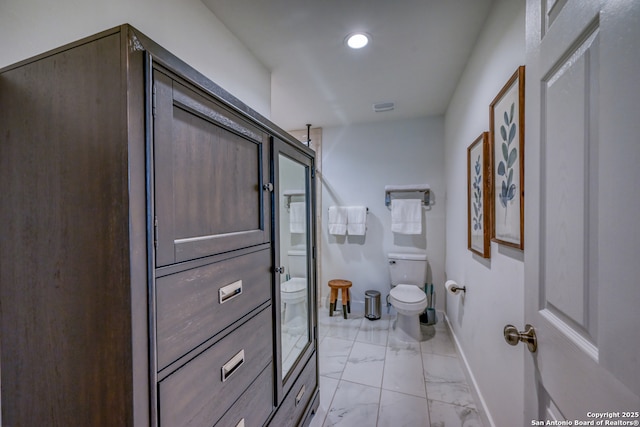 bathroom featuring toilet