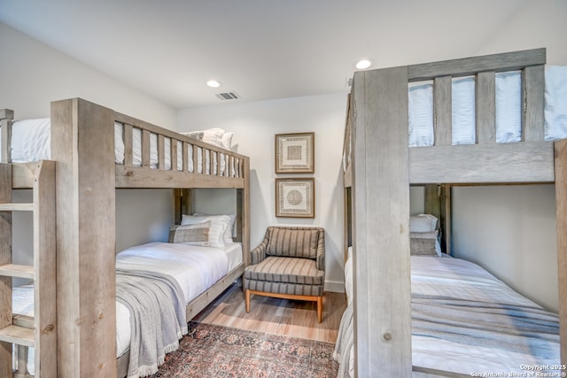 bedroom featuring hardwood / wood-style floors