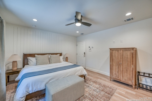 bedroom featuring ceiling fan and light hardwood / wood-style floors