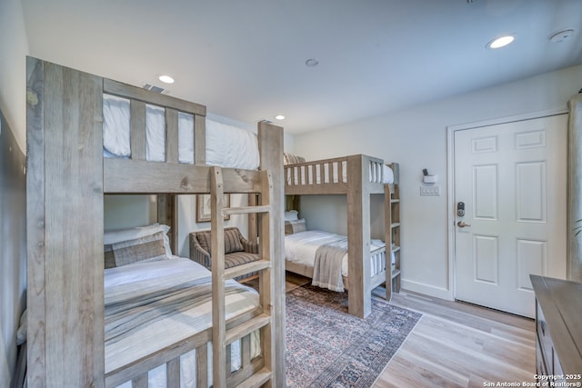 bedroom featuring light wood-type flooring