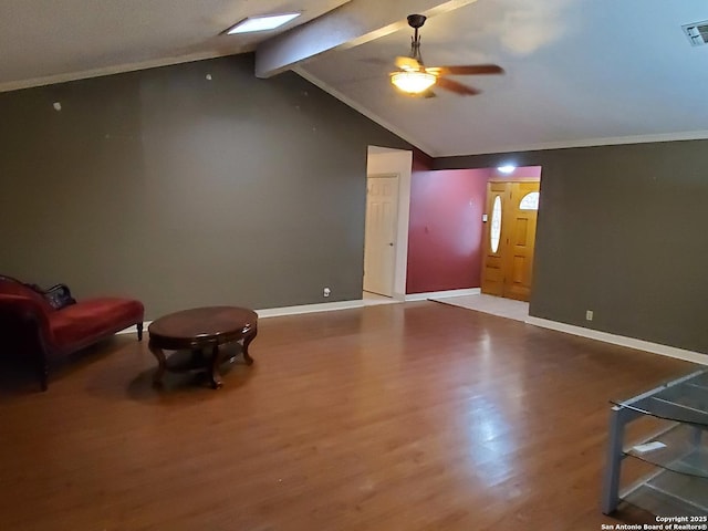 unfurnished room featuring crown molding, wood-type flooring, lofted ceiling with beams, and ceiling fan