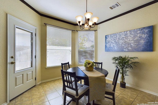 tiled dining space featuring a notable chandelier and crown molding