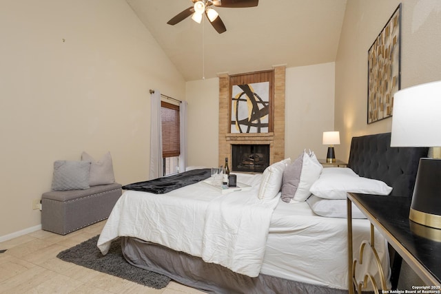 bedroom featuring a brick fireplace, high vaulted ceiling, and ceiling fan