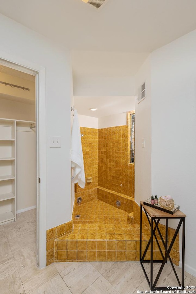 bathroom featuring a tub