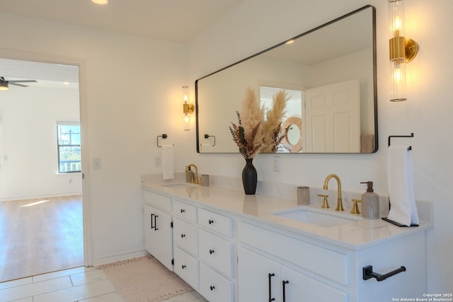 bathroom with vanity, ceiling fan, and tile patterned floors