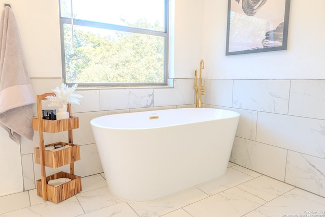 bathroom with a washtub