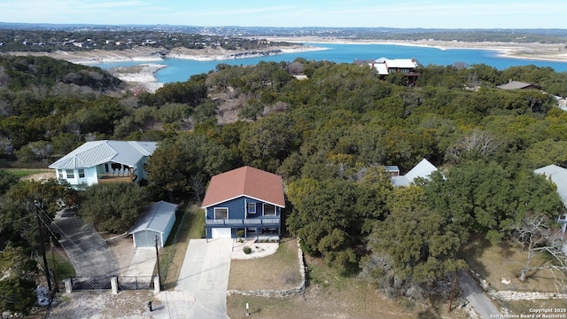 birds eye view of property featuring a water view