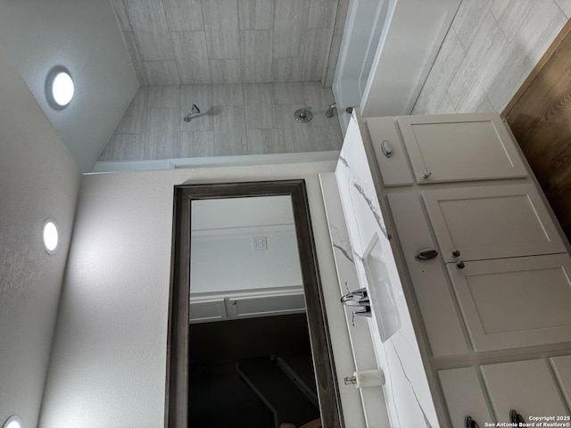 14122 Churchill Ests Unit 204, San Antonio, TX 78248 - bathroom with a shower and vaulted ceiling