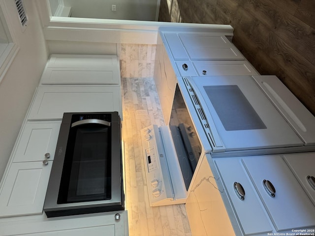 14122 Churchill Ests Unit 204, San Antonio, TX 78248 - kitchen with white cabinetry