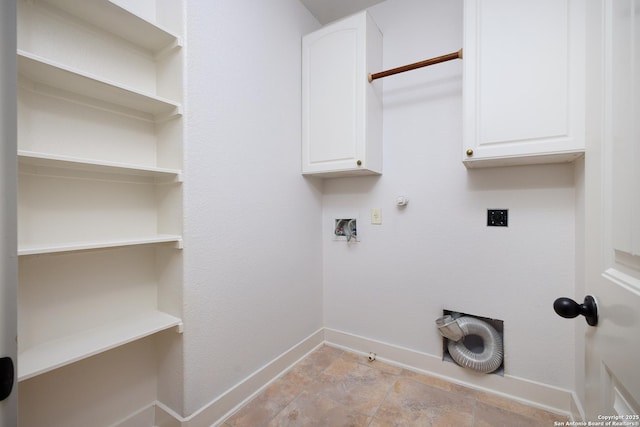 clothes washing area featuring cabinets, gas dryer hookup, electric dryer hookup, and hookup for a washing machine