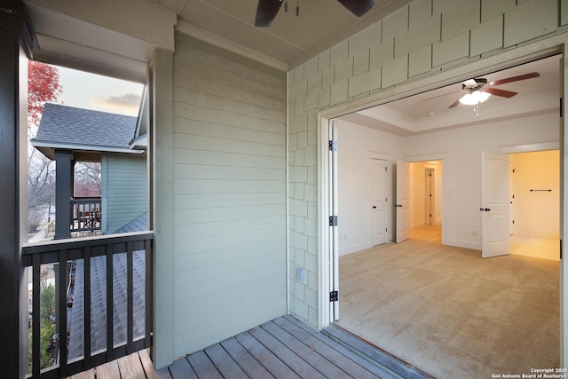 balcony featuring ceiling fan