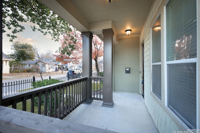 balcony featuring a porch