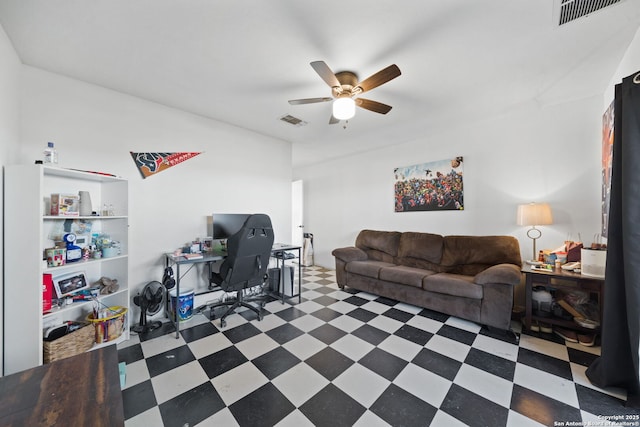 living room featuring ceiling fan