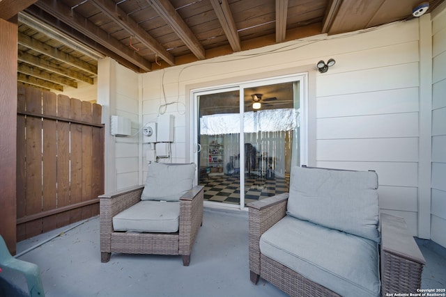 exterior space featuring wooden ceiling, wooden walls, and concrete flooring